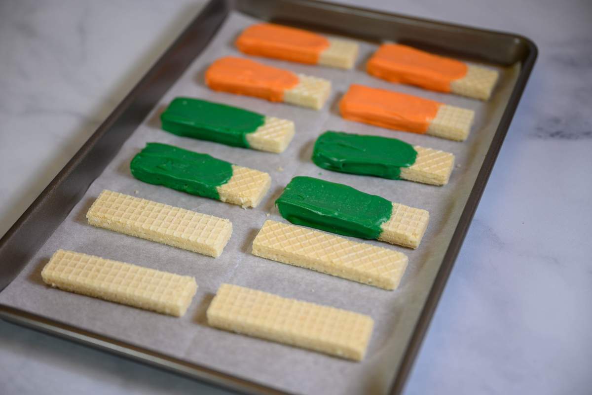 Dipping Cookies in Melted Colored Candy Melts