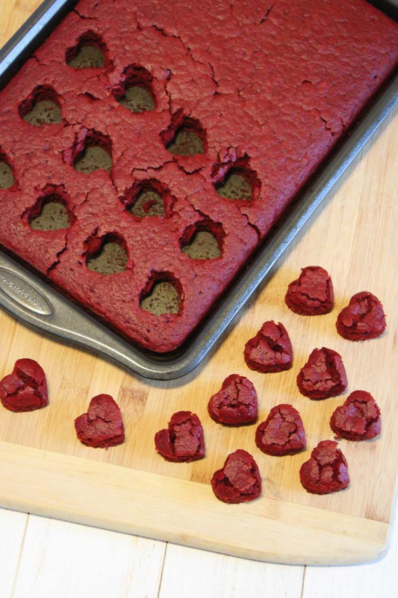Cutting out red velvet hearts
